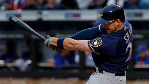 Giants score four in 10th to down Brewers